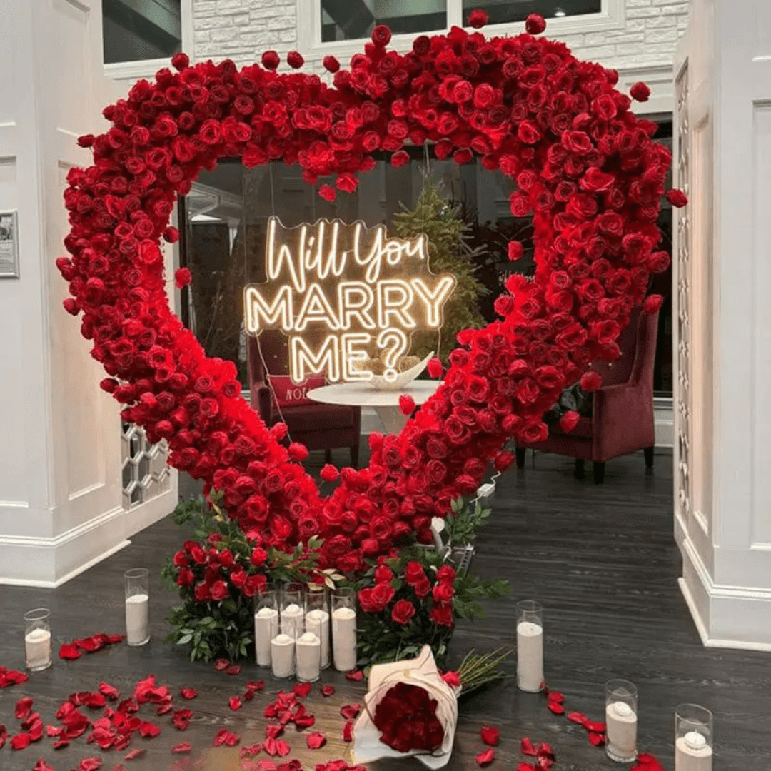 Red floral heart proposal setup in Houston